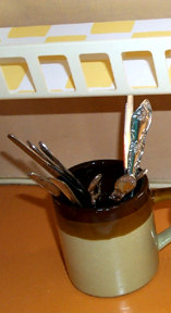 Spoon Mug on clean counter.